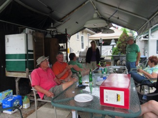 Plenty of time to socialize between trains...
L-R: Barry, Paul, Leila, Nicole, Ed, Diane...and somebody's knees... 
