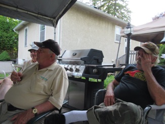 At the end of the day, John, Fred, and Ken relax.