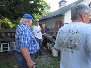 Craig Leigh is busy this morning. That's Ken and Mike in the middle, by the shed.