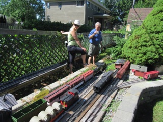 We have to wait until Ironwood is clear before we can proceed. Mike photographs the progress while Nicole looks on.