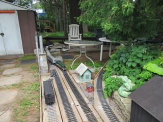 Here's the train coming into Peter's Pond. We stop for 1-2 minutes at each passenger station on the layout.