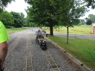 July 18.  On Monday we visit the Finger Lakes Live Steamers. They have a #1 gauge track, and two ride on tracks: 1" scale, and 1 1/2" scale.  We get a ride on Ric & Jan's 1 1/2" scale railbus.