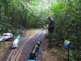 This time, I'm the engineer and Ken is the conductor.  These trains don't stop as quickly as the smaller scales!