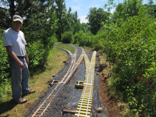 July 18.  After we complete the puzzle, Roger took us over to a new section of the "layout". They plan on more operations in the future.