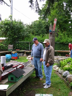 Two person crews are the norm. For this session, Doug was the conductor and I was the engineer. The conductor is responsible for making sure that cars are switched correctly, while the engineer “drives” the train. On the IPP&W, there is no track power; all the engines are powered with battery and use remote controllers to set speed and direction.