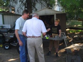 July 21.  Saturday morning, and it’s time to set out the narrow gauge cars.