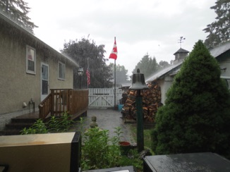 The skies darken and the rain begins.
The rain finds us seeking shelter.