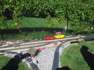 July 17.  Then it's down to Cora's Corners. There's a wye here that is used to turn locomotives from either end of the railroad. Quite clever.