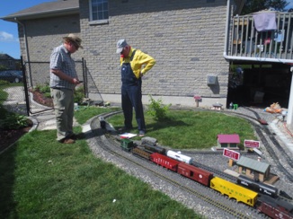 July 17.  Over at HAYES FUEL we meet John and Stu and wait for them to finish switching before we move in.