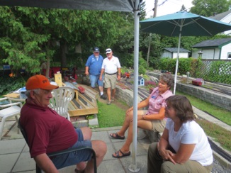 July 18.  When the runs are done, it's just a great time to sit around and socialize. Here, Fred talks to Jane and Jan while Andy and Ric come up between Cedarrock and Spruce.