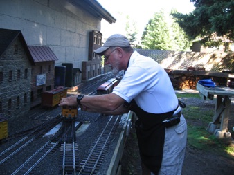 July 21.  Saturday is operations day! Ric Golding was yardmaster at Craig Leigh. Once again, there were some new buildings added to the layout since our last visit.
