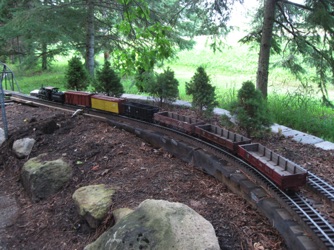 I did get a chance to run the drop bottom gondolas that I had made for Doug, along with the original built from a Don Winter kit. Doug has done a lot of work on his railroad since our last visit. It's always fun to see the changes and run my train around while we renewed old acquaintances.