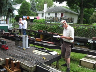 Gord Bellamy was preparing to run Nelson Yard.  Bill Scobie and Doug discuss trains in the background.