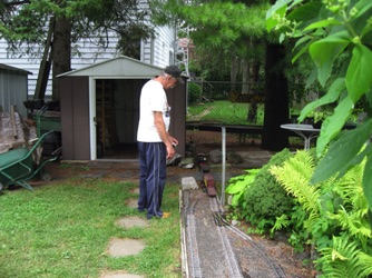 July 18.  Ken is working his train at the siding at Peter's Pond.