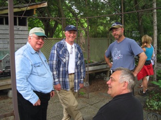 It was a time to renew old acquaintances and form new friendships.  Here Don Howard, Terry Foley, Gaetan Charette and Fred Mills discuss the latest in operations. Terry came from England to visit the railroad and participate in the events of the weekend. 