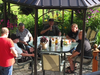 After running trains on Doug’s layout, we all gathered for another great barbeque at his patio overlooking the river. It was the start of another great Invasion.