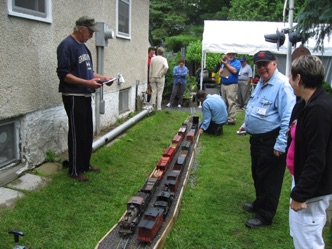 It does get rather crowded. In this shot, our train is running light out of Nelson Yard so we were able to sneak in behind John's live steam train for a meet at Mercer with Ken and Don's train.