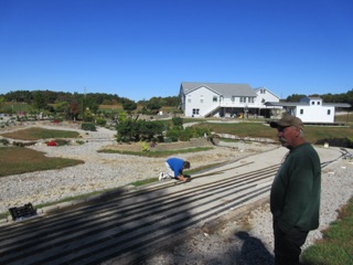 We were just in time to watch Jane finish some work - adding more track in between Memphis and Evansville. Ken looks on.