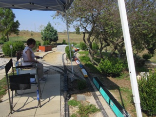 October 14.  Jean relaxes in the shade as I direct the switching.