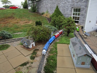 October 14.  Sunday is a "bit" warmer than Saturday, but rain continues to threaten.
I haven't worked Overlook for awhile, so decide to do that today.
The train leaves the basement...this time headed on the "left" track