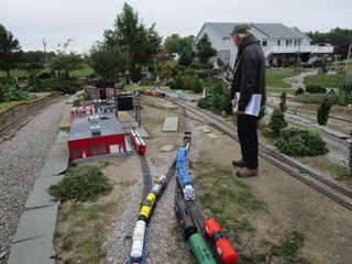 Tank cars are swapped - the 5 cars from the train are traded with the five cars on the spur.