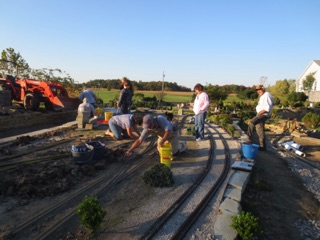 Ken and I decide they need some GOOD supervisors. We lcouldn't find any, so we headed up to do the job ourselves. Meanwhile, the rest of the crew pitched in to help install track and ballast. The sun was setting so we had to quit, leaving just a bit to do for Saturday. Ken and I decide they need some GOOD supervisors. We lcouldn't find any, so we headed up to do the job ourselves. Meanwhile, the rest of the crew pitched in to help install track and ballast. The sun was setting so we had to quit, leaving just a bit to do for Saturday.