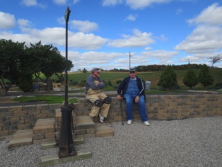 October 18.  Saturday is still clear, but colder and windier. There's a bit of work to be done, but you're allowed a generous rest after ballasting Memphis/Evansville. Here, Ric takes time to talk with Dave Masters.