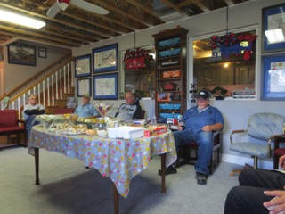 October 19.  After that run, there's just enough time to grab something to eat in the crew lounge before our early departure. L-R: Rita and Dan Patterson, Doug Matheson, and Andy.