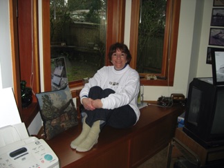 Eventually the cold and the rain gets to Jean and she retreats inside to warm up.
