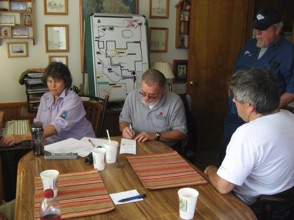 The dispatch office is busy as trains are prepared for the day.