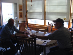 Rodney and Ric discuss the next train in the dispatcher’s office.