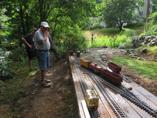 Bob has also added a new area: Oakhill, which is reached from a branch out of Majestic. It's quite the puzzle. Here Ric ponders his next move while Bob and Ken look on.