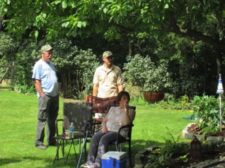 August 11.  Ken, Bob and Jean ponder the action...