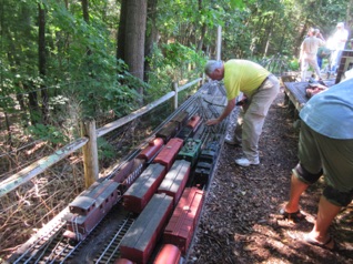 I make up a train in Franklin Falls (the green boxcab) and get ready to take it out, while Paul prepares his train for departure.