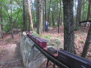 It's only nine cars long as we're headed up hill and that K-27 can only pull so many. Here's the train leaving Cumbres with Andy waiting at the next plug in point.