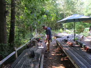 July 27.  Saturday morning and it is time to think about operations.  Ken was one of the first to take a train out as he made up his train in Franklin Falls.