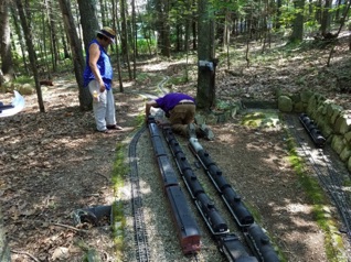 Before I could even leave, I had a meet with the Misty Flyer, operated by Jane and Ken.
I ran about 4 more trains after that, including a real brain-teaser around big rock. What fun!