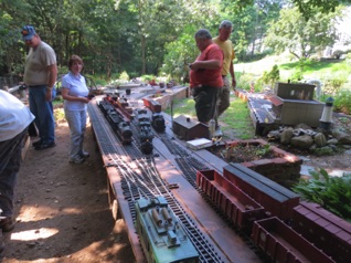 Jean is the engineer for the boxcab, as Jon and I act as yard masters for Burke Yard. L-R: Al, Jean, Jon., Paul Jean is the engineer for the boxcab, as Jon and I act as yard masters for Burke Yard. L-R: Al, Jean, Jon., Paul