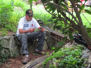 August 18.  Ken is also waiting, not noticing the yard engine coming up on his waiting locomotive. I don't think it was a BIG crash...