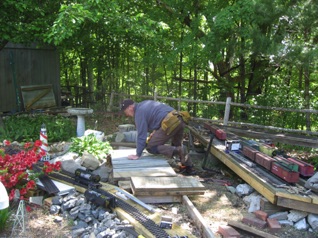 May 13. Thursday. Sean showed up just a bit later and was soon constructing platforms for all of the yards that Bob wanted. I quickly found out he worked faster when I didn't help. May 13. Thursday. Sean showed up just a bit later and was soon constructing platforms for all of the yards that Bob wanted. I quickly found out he worked faster when I didn't help.
