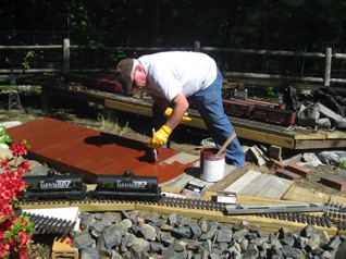 I get to stain the yard base.