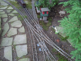 August 11.  On the way up, you cross this pair of double slip switches. It works very well and Jim says that it's less troublesome than any of his other switches. 