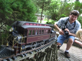 Kevin tries to get a picture of Jack's locomotive.