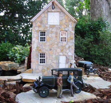 I posed my latest figures with a 1:18 scale model in front of Smith Pond Mill.
They look right at home.