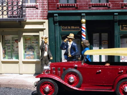Next, I built a small scene for the front of my barbershop. Two men talking while a lady walks by.