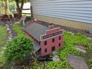 April 6.  A shot of Jackson.  L-R:  Buchanan Tool & Die, the water tower, the bucket coaling station, Salmons Produce. Matheson Textiles blocks a view of Mills Fuels.