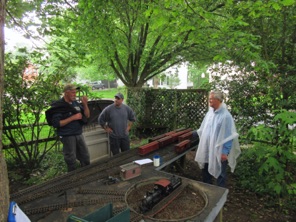 May 13.  Jim Kottkamp is the only one prepared for the rain.