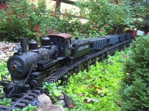 October 9.  A train full of hoppers crosses the trestle.