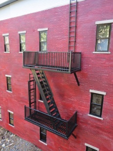 March 9.  The fire escape gets installed on the Rosseau Hotel.