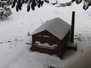 January 27.  Buchanan Tool & Die is under a holly tree.